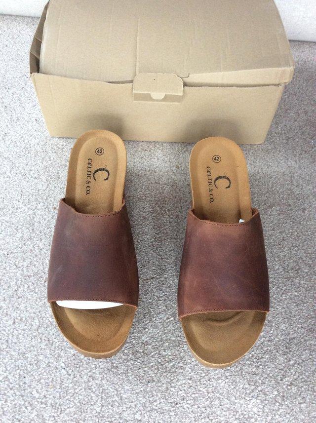 Preview of the first image of Celtic & Co Leather Mules Size 8.