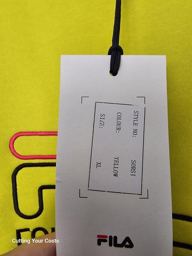 Preview of the first image of Original Yellow XL Fila Jumper..