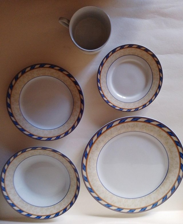 Preview of the first image of 40 Piece TIENSHAN fine china. Excellent condition..