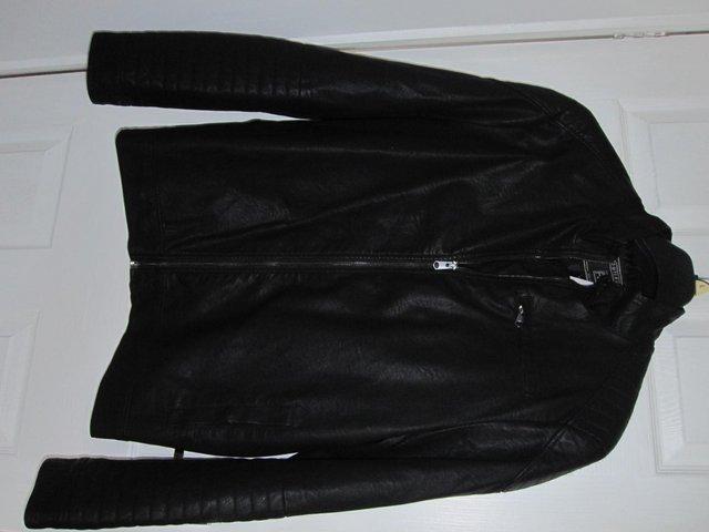Preview of the first image of NEW WITH TAGS FAUX LEATHER JACKET.