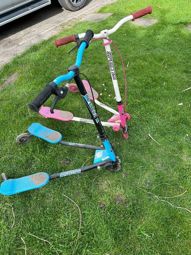 Preview of the first image of Sporter scooters large pink and blue.