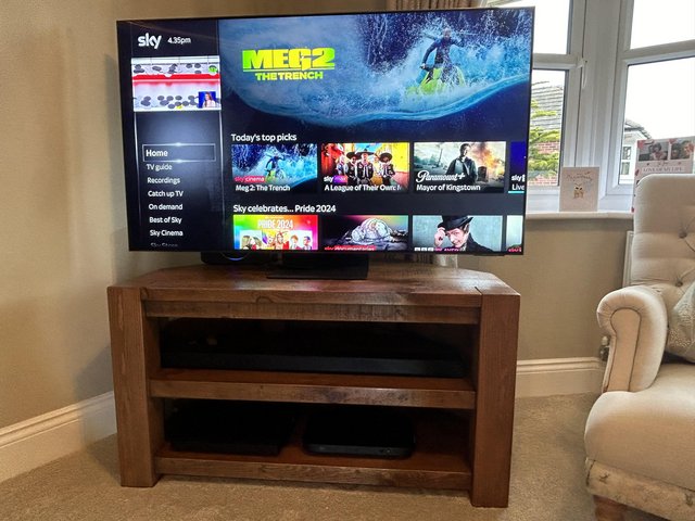 Preview of the first image of Solid Dark woodcorner tv stand up to 55”.