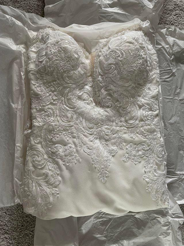 Preview of the first image of Mori Lee Wedding Dress - Professionally Cleaned.