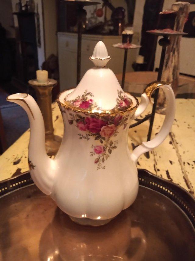 Preview of the first image of Royal Albert Country Rose coffee pot.