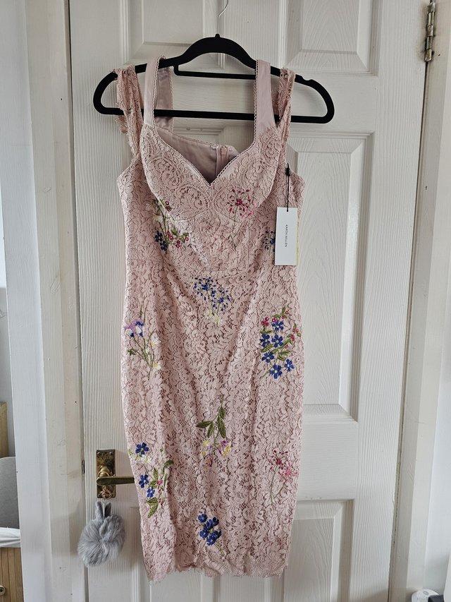 Preview of the first image of NEW Karen Millen size 12 lace floral dress.