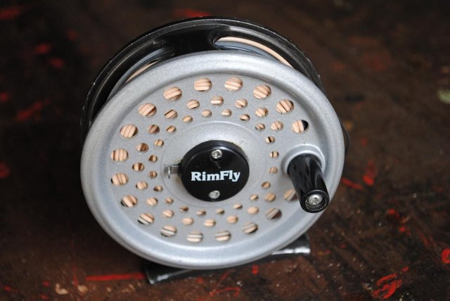 Preview of the first image of Fly Fishing Reel by Rimfly complete with fly line.
