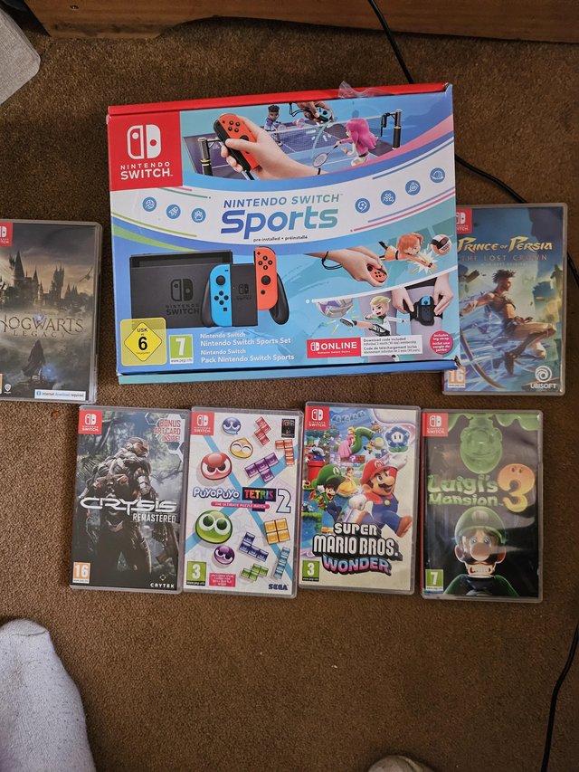 Preview of the first image of Nintendo switch sports bundle with 6 physical games and 5m.