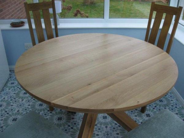 Image 2 of OAK FURNITURE LAND CIRCULAR OAK DINING TABLE AND FOUR CHAIRS