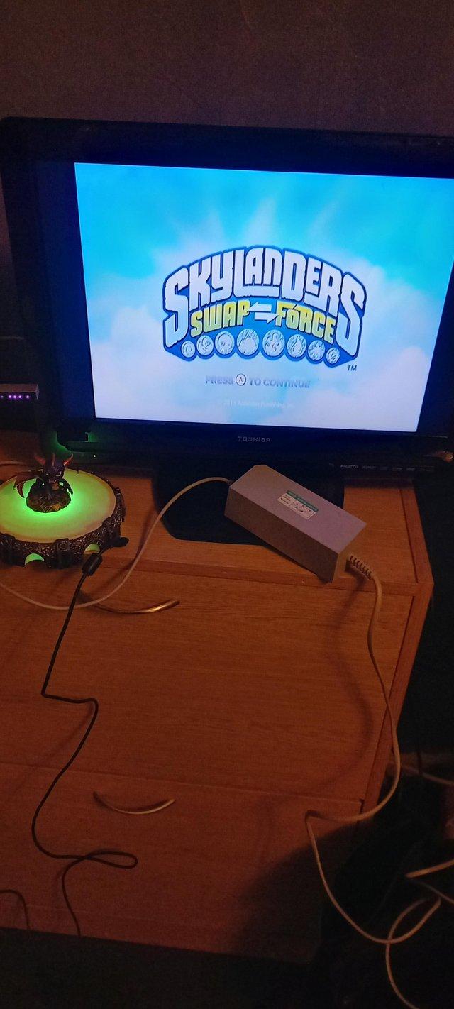 Preview of the first image of Wii console,2 skylanders games,skylanders figures and tv/dvd.