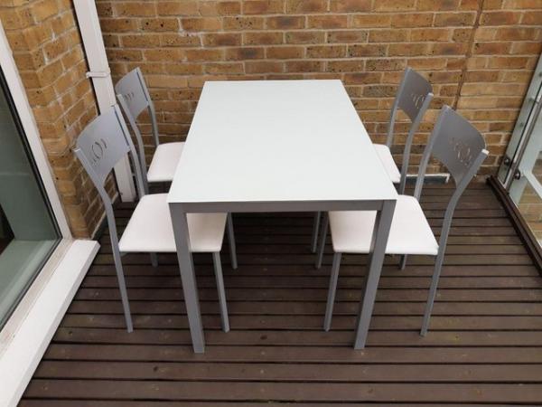 Image 3 of White glass top dining table and four chairs
