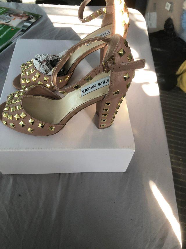 Preview of the first image of Steve Madden studded shoes size 6.