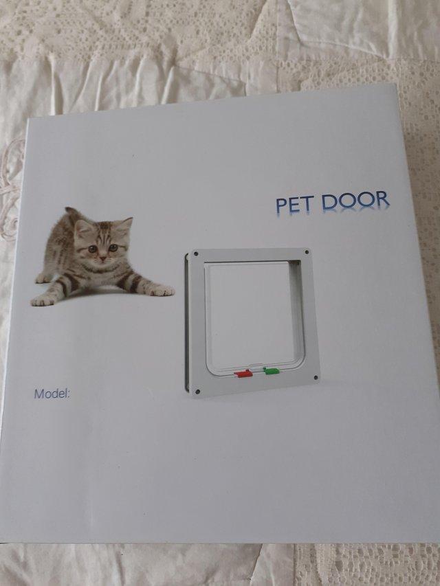 Preview of the first image of Pet Door cat flap unused and in the box.