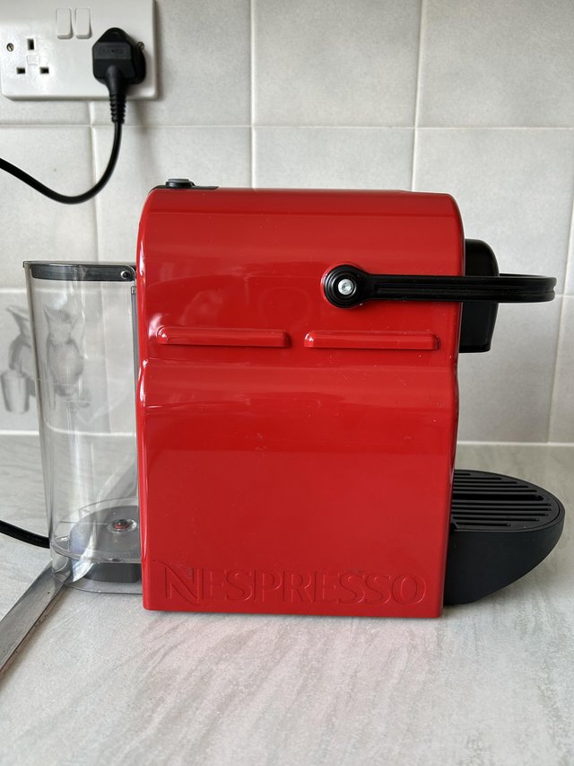 Preview of the first image of Nespresso Inissia XN1005 Coffee Pod Machine – Red.