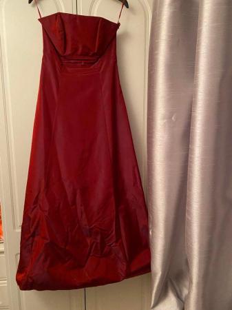 Image 2 of Ball Gown in burgundy colour with netted lining
