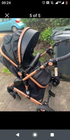 Image 3 of Blank and gold pushchair
