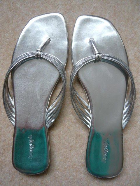 Preview of the first image of Flip flops - Marks and Spencer Autograph, silver.