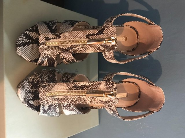 Preview of the first image of Kurt Geiger Carvel Snakeskin High Heels.
