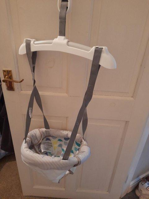 Preview of the first image of BABY DOOR BOUNCER VERY GOOD CONDITION HARDLY USED.