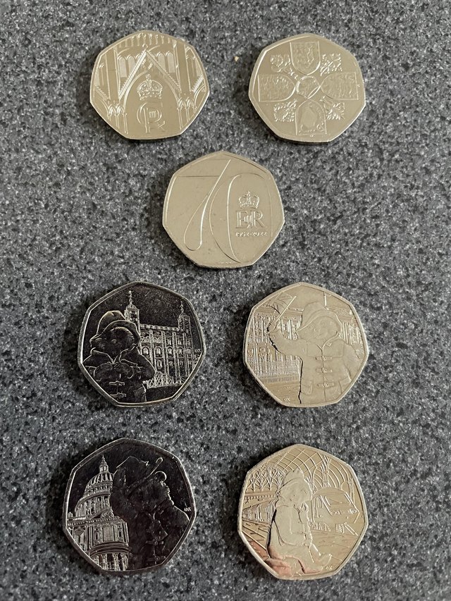 Preview of the first image of King Charles,Paddington and late queen coins.