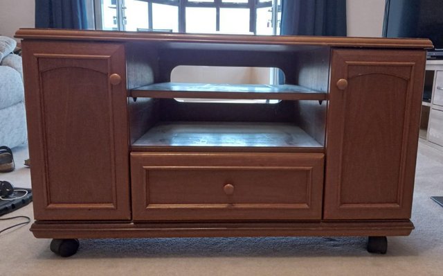 Preview of the first image of "Stag" brand TV unit in teak finish.