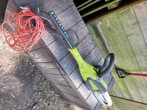 Image 3 of electric chain saw.for sale good conditin used only once.