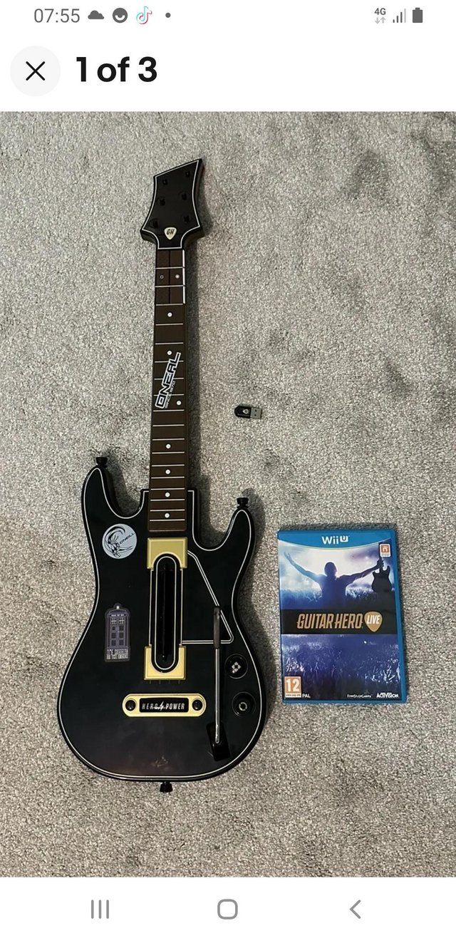 Preview of the first image of Nintendo Wii U, Guitar Hero Live. Guitar, Game and Dongle.