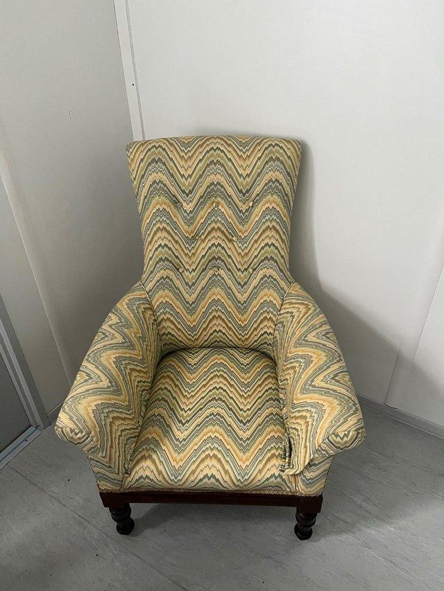 Preview of the first image of Antique Edwardian high backed armchair.