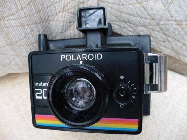 Preview of the first image of POLAROID INSTANT 20 LAND CAMERA.