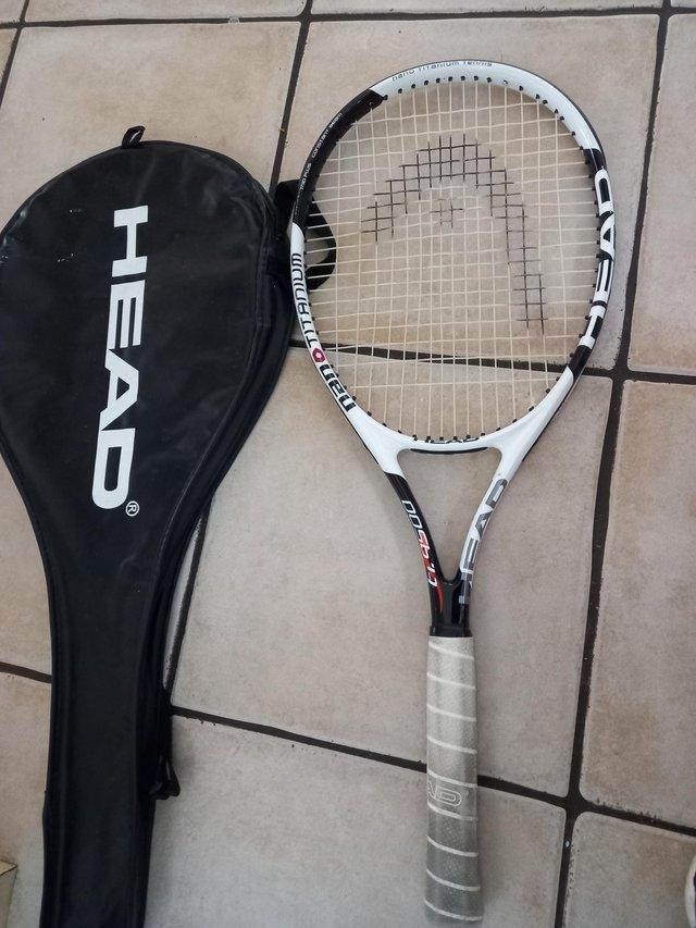 Preview of the first image of Lawn tennis racket Heads- Nan Titanium with Heads holding ..