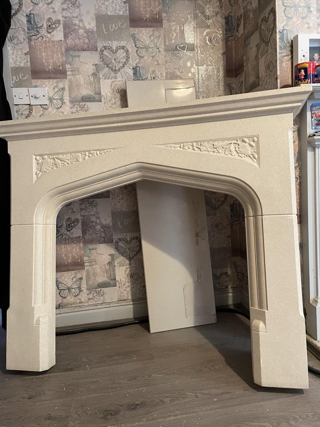 Preview of the first image of Marble 3 piece fireplace and surround.