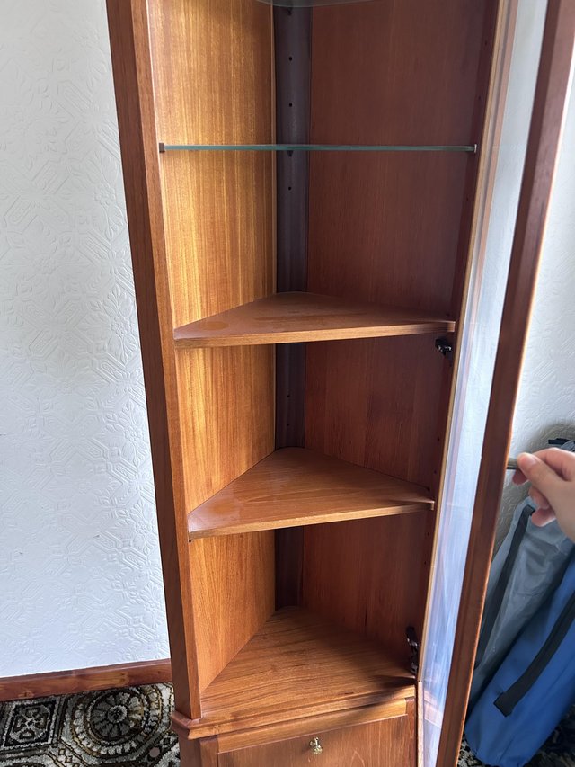 Preview of the first image of Corner cabinet with shelves and a small cupboard.