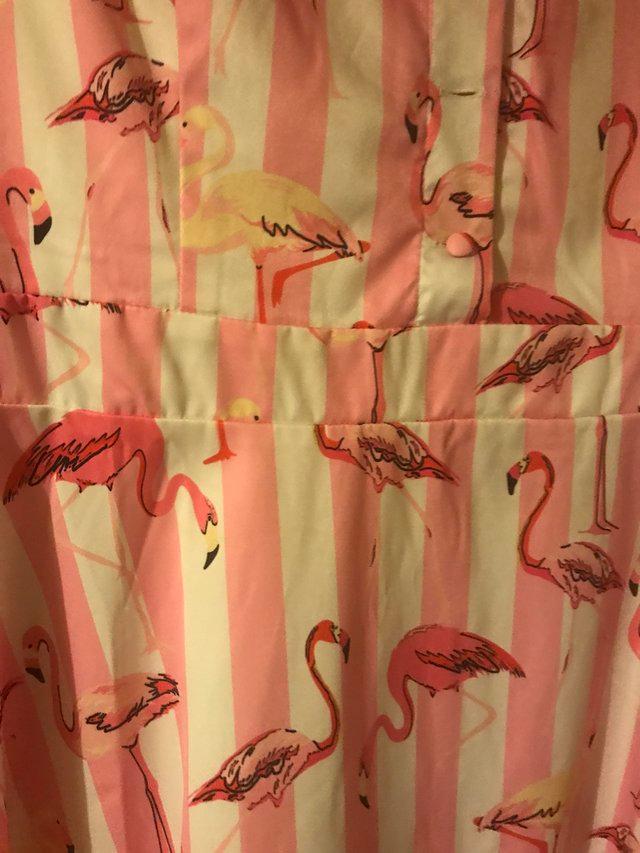 Preview of the first image of Lindy pop flamingo dress size 16.