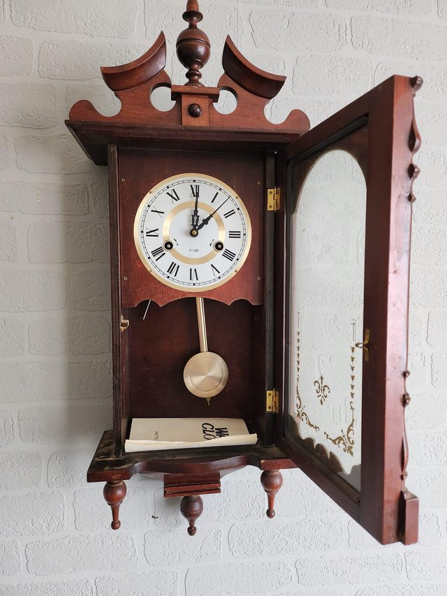 Preview of the first image of 31 Day Pendulum Wall Clock.
