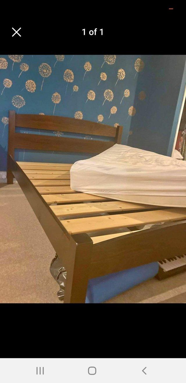 Preview of the first image of Warren Evans wooden king size bed frame.
