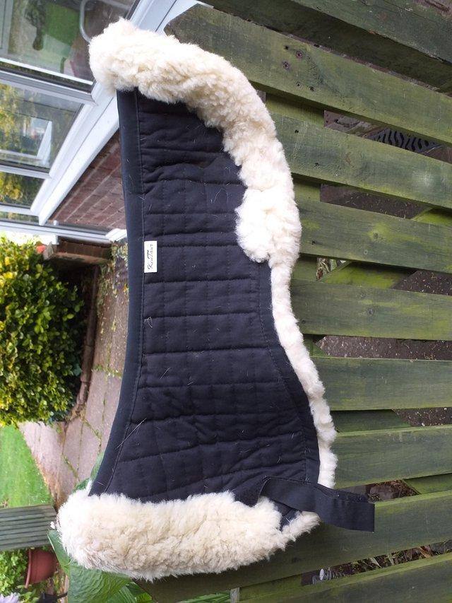 Preview of the first image of Horse half pad full size in black with sheep skin.