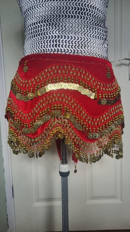 Preview of the first image of Lovely belly dance hip scarf. Very good condition..