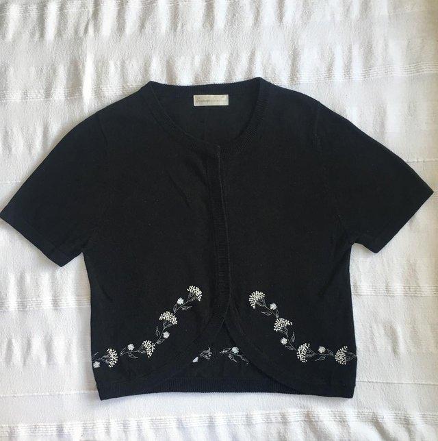 Preview of the first image of Black short sleeve cardigan, embroidery, beads. Small.