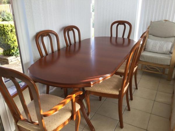 Image 1 of Oval Extendable Dining Room Table