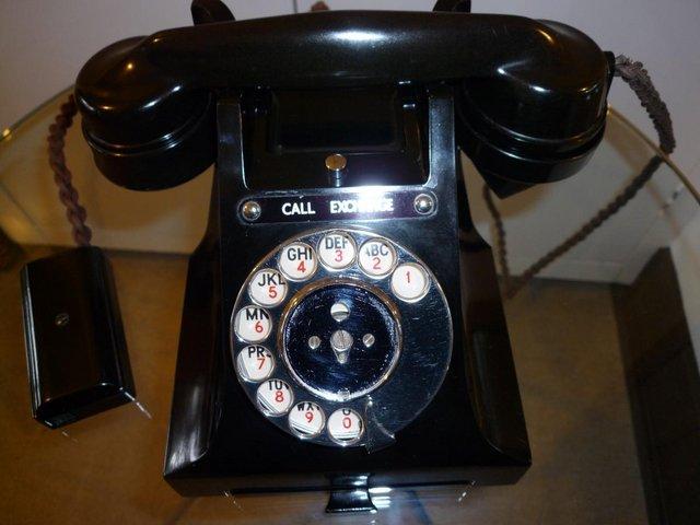 Preview of the first image of Old fashioned black Telephone.