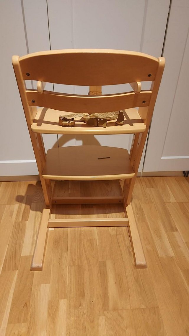 Preview of the first image of BabyDan High chair in natural wood with accessories for sale.