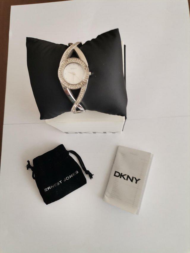 Preview of the first image of DKNY Women's Crystal Accented Bracelet Watch.