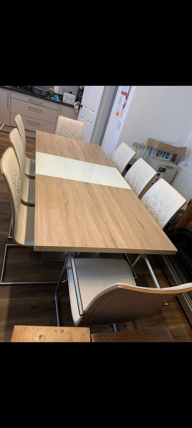Preview of the first image of Harvey's 8 person dining table.