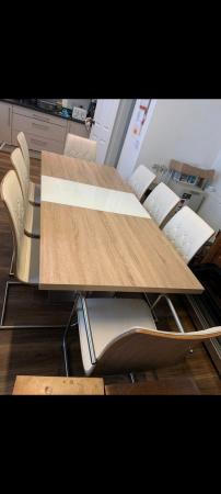 Image 1 of Harvey's 8 person dining table