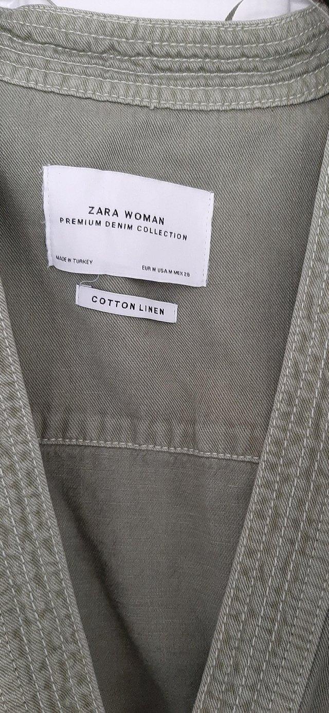 Preview of the first image of Zara Jacket light green belted.