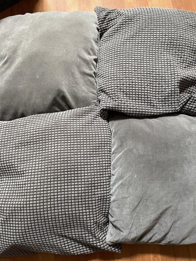 Preview of the first image of 4 grey cushions, 65 cm x 65 cm. 26 inch x 26 inches..