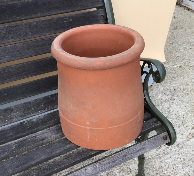 Preview of the first image of NEW Hepworth Terracotta Clay chimney pot, roll top..