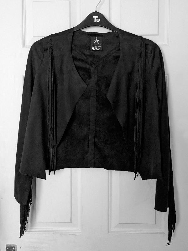 Preview of the first image of Ladies Faux Suede Black Tasselled Jacket - Size 8    B29.