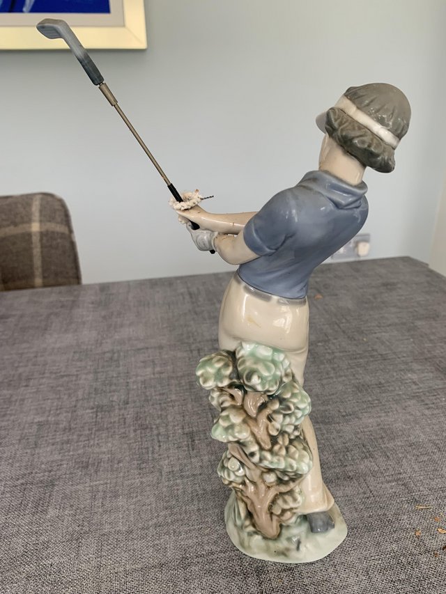 Preview of the first image of Lladro “Lady Golfer” Figurine.