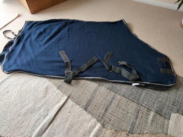 Image 1 of Masta pony 5' 3" blue fleece rug
