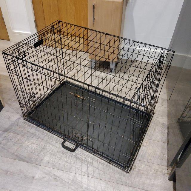 Preview of the first image of Large RAC metal fold flat dog crate.